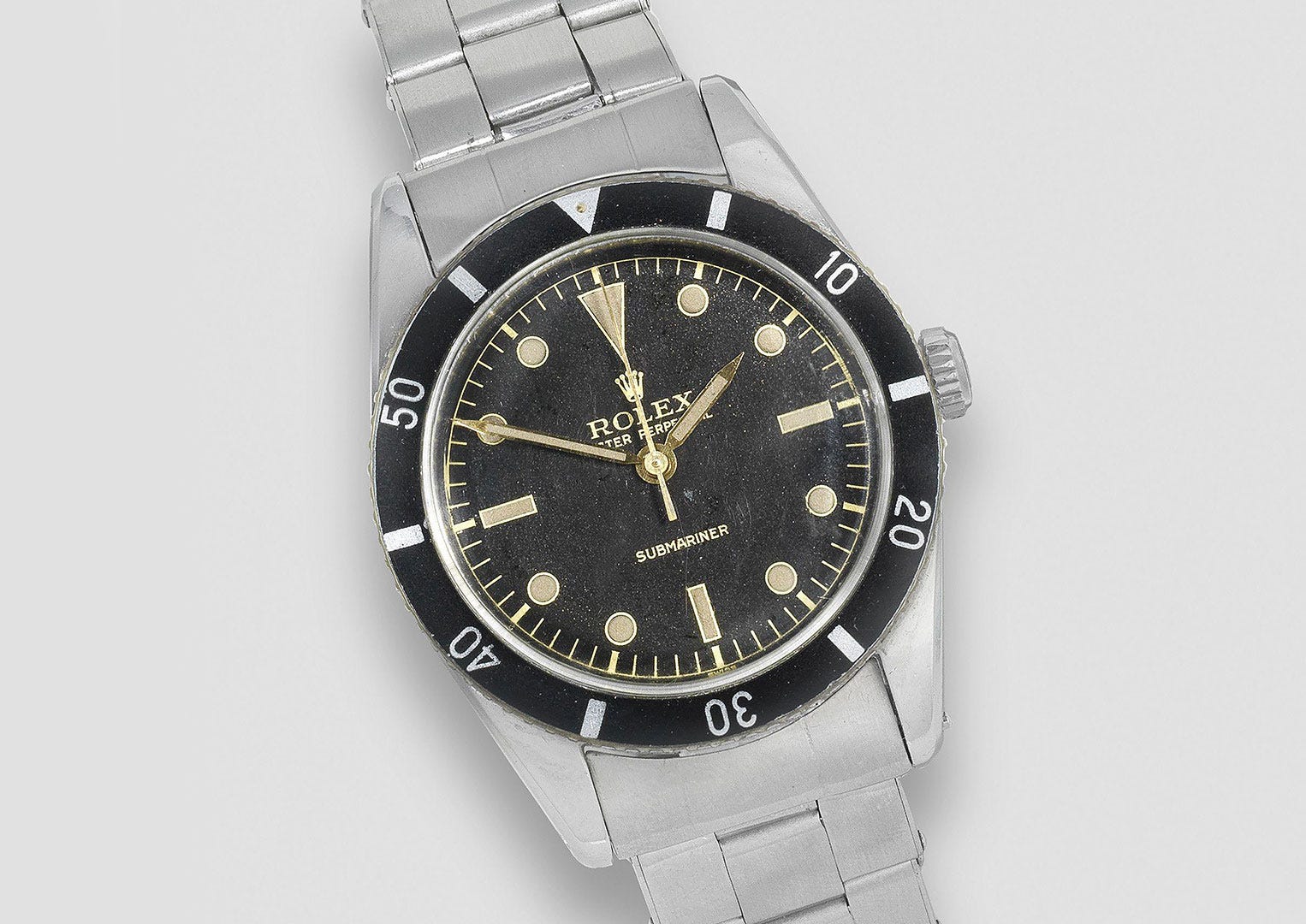 The original Submariner reference 6204—note the text-light dial. Image courtesy of Bonhams
