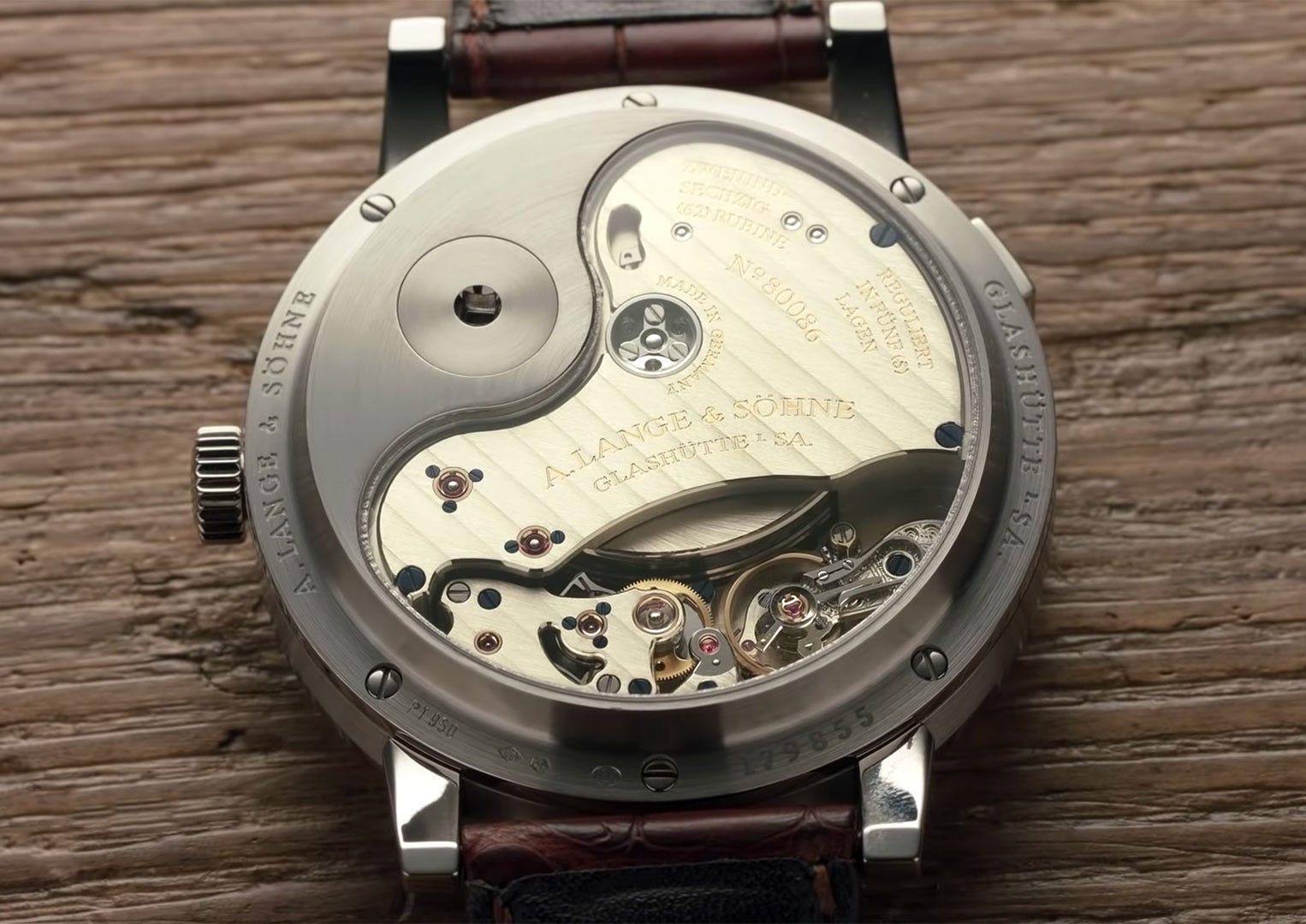 The floral engraving of an A. Lange & Söhne balance cock and whiplash spring is done, free-hand, in-house. Making each watch truly unique
